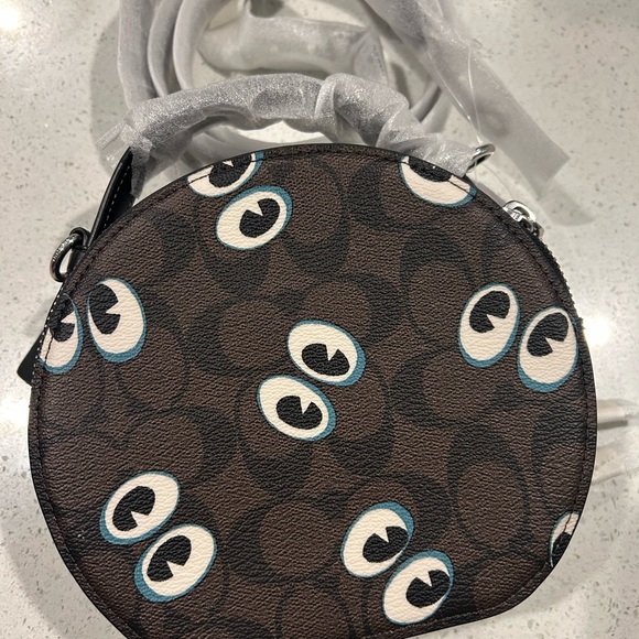 Coach Canteen Signature Canvas With Halloween Eyes
New with Tag - Picture 8 of 15